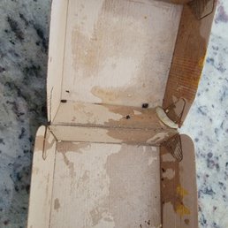 Box proving how much grease was dumped on my burger. Box proving how much grease was dumped on my burger.