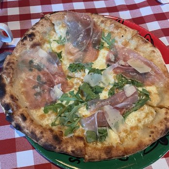 Trattoria Taverniti - Bianca pizza with prosciutto arugula and Parmesan - Italian Near Me - Toronto, Ontario Trattoria Taverniti - Bianca pizza with prosciutto arugula and Parmesan - Italian Near Me - Toronto, Ontario