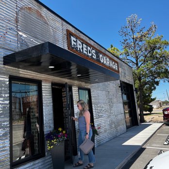 Freds Garage - a woman standing outside of a store - Coffee & Tea Near Me - Shallowater, Texas Freds Garage - a woman standing outside of a store - Coffee & Tea Near Me - Shallowater, Texas