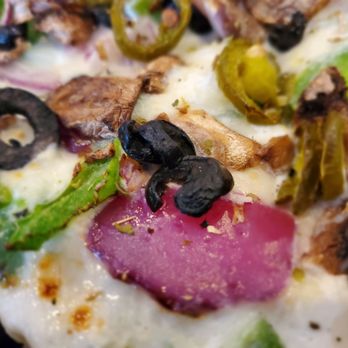 Sabrina's Pizzeria - Close up of vegetarian pizza - Pizza Near Me - Oakley, California Sabrina's Pizzeria - Close up of vegetarian pizza - Pizza Near Me - Oakley, California