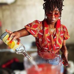 Merida.B Events  - Seen here Bartending a Vendor Market in Downtown Austin