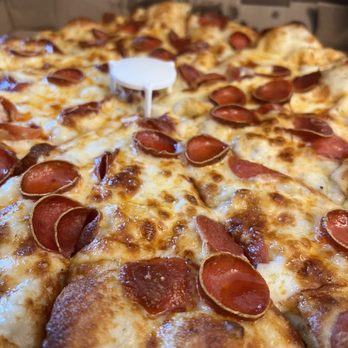 Round Table Pizza - Cheese and pepperoni pizza on white sauce - Pizza Near Me - Fair Oaks, California