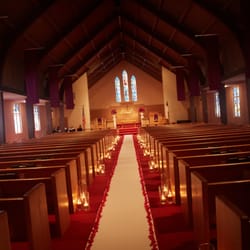 Yonan's Floral - Candlelit/rose petal church aisle