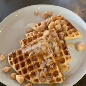 Cheeky's - waffle: coconut cream, macadamia nuts and hm guava syrup - Breakfast & Brunch Near Me - Palm Springs, California Cheeky's - waffle: coconut cream, macadamia nuts and hm guava syrup - Breakfast & Brunch Near Me - Palm Springs, California