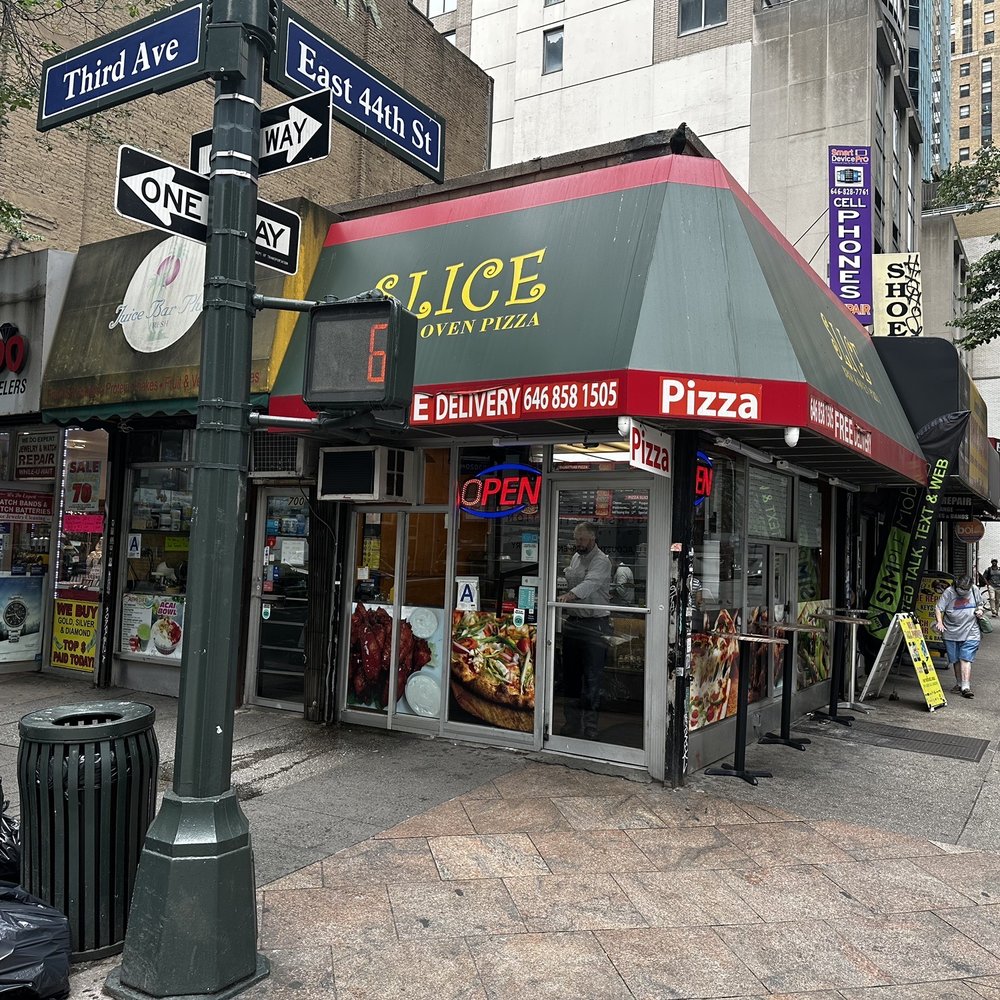 Slice Pizza - the outside of a restaurant - Pizza Near Me - New York, New York Slice Pizza - the outside of a restaurant - Pizza Near Me - New York, New York