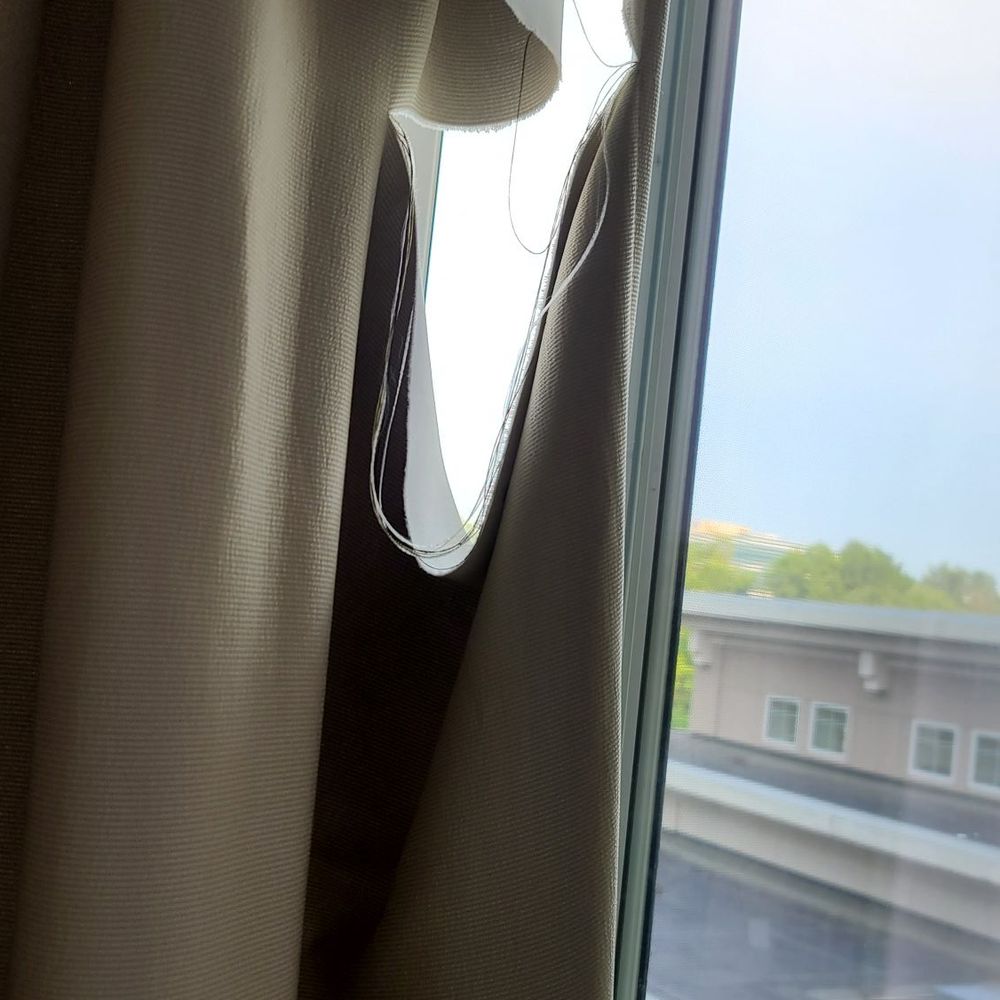 Torn drape. Torn drape.