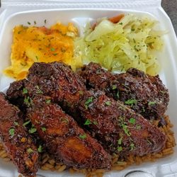 Bahamas Caribbean Cuisine - Jerk wings Coconut beans and rice Baked Mac and cheese Steamed cabbage