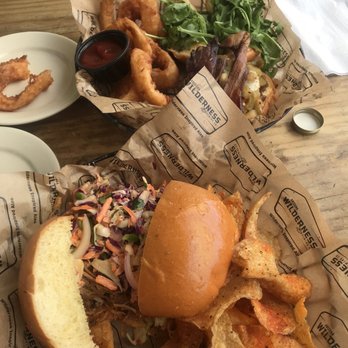 Arizona Wilderness Brewing - Pulled pork with coleslaw and an amazing grass fed burger.  The best onion rings around and some flavorful fresh chips - Breweries Near Me - Gilbert, Arizona