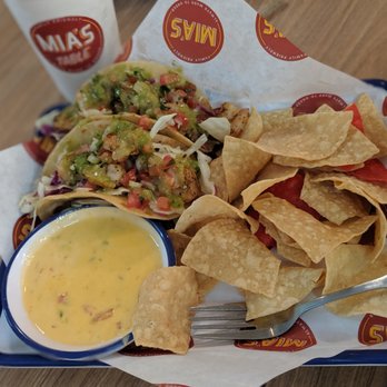 Mia's Table - Shrimp tacos with chips and queso. - American Near Me - Webster, Texas Mia's Table - Shrimp tacos with chips and queso. - American Near Me - Webster, Texas