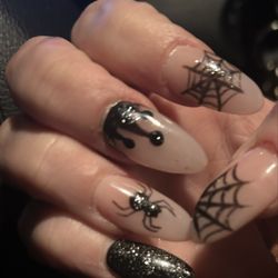 Natural Nails - Design terrible, nails filed all different shapes, and cut my thumb