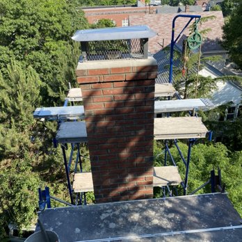 Advance Chimney - Chimney rebuilt in Boston with new cement crown, stainless steel liner and cap. - Chimney Sweeps Near Me - Hyannis, Massachusetts