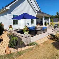 Engle Solutions - Paver Patio and seating walls. Natural stone features and new Plantings.