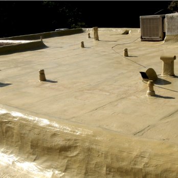 SunRise Roofing - Capping and parapets to the flat areas are one continuous surface. No seams! Texture is from old roof & bolts of embedded polyester fabric. - Roofing Near Me - Albuquerque, New Mexico