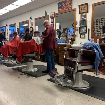 Village Barber Shop 2 - My son and one of the barbers. - Barbers Near Me - Euless, Texas Village Barber Shop 2 - My son and one of the barbers. - Barbers Near Me - Euless, Texas