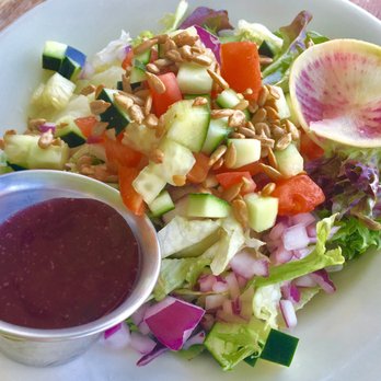 Snowgoose Grille - Garden salad with Huckleberry dressing - American Near Me - Saint Mary, Montana Snowgoose Grille - Garden salad with Huckleberry dressing - American Near Me - Saint Mary, Montana