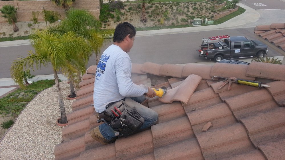 Slide of Dennis Cook Roofing