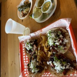 Best tacos this side of Saturn; and probably the other side too, just never been there. Two pastor, one chorizo, one steak. Best tacos this side of Saturn; and probably the other side too, just never been there. Two pastor, one chorizo, one steak.