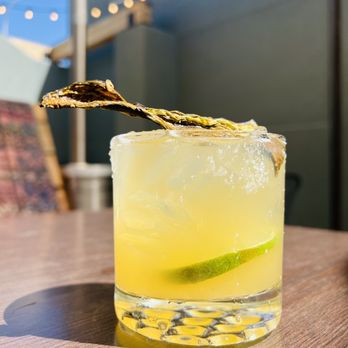 Safe House Distilling - a margarita with a lime slice on the rim - Bars Near Me - Albuquerque, New Mexico