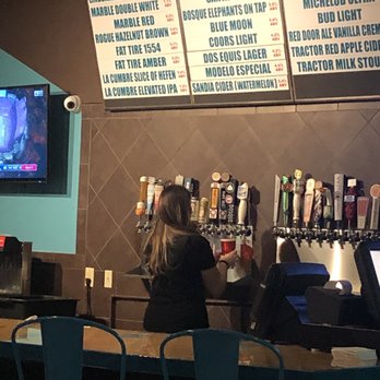 Turquoise Desert - Lady taking foam off beer with her finger!!! - Sports Bars Near Me - Rio Rancho, New Mexico