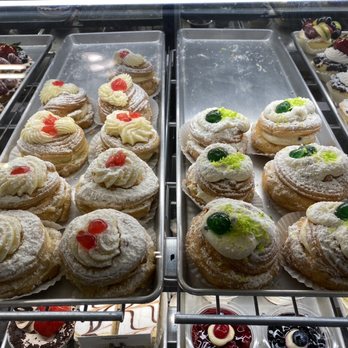 Palermo's Cafe & Bakery - Zeppole (left) and Sfingi (right) - Pizza Near Me - Little Ferry, New Jersey Palermo's Cafe & Bakery - Zeppole (left) and Sfingi (right) - Pizza Near Me - Little Ferry, New Jersey