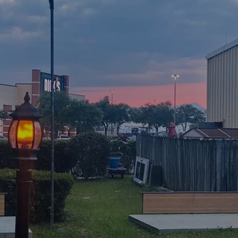 Cordova Lanes - Sun sets right over the garden on the patio. Pirate'cola's best kept secret. - Bowling Near Me - Pensacola, Florida