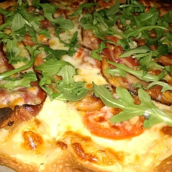 Greenbush Bar - Pizza special. Gorgonzola cheese, neuskes bacon, tomato and fresh arugula. Wow was that good. - Italian Near Me - Madison, Wisconsin