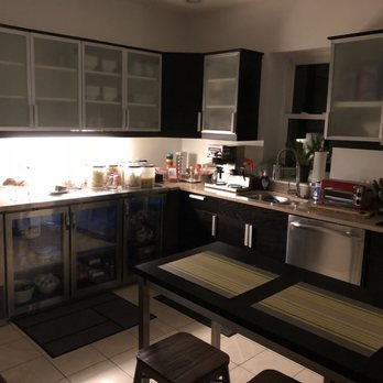 House 5863 Bed & Breakfast - Kitchen with lights off/nighttime. Really well stocked: soda, fruit, cereal, etc. This isn't The Ritz, not supposed to be, comfy and nice. - Bed & Breakfast Near Me - Chicago, Illinois