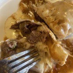 Rancho Fiesta - Chimichanga - different. The beef isn't ground beef. It's more barbacoa texture. And the tortilla isn't "hard fried" still very soft.