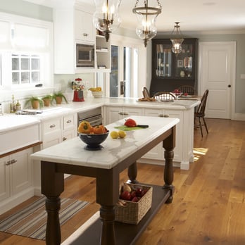 Interior Pros - Design Studio - a kitchen with a center island - Flooring Near Me - San Luis Obispo, California Interior Pros - Design Studio - a kitchen with a center island - Flooring Near Me - San Luis Obispo, California