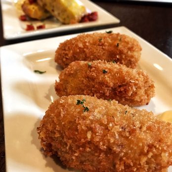 Toro Kitchen + Bar - The Croquetas were tasty filled with Serrano ham and manchego cheese - Tapas Bars Near Me - San Antonio, Texas Toro Kitchen + Bar - The Croquetas were tasty filled with Serrano ham and manchego cheese - Tapas Bars Near Me - San Antonio, Texas