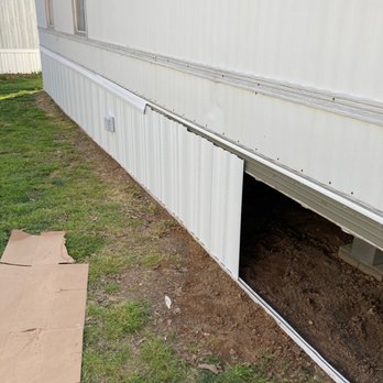 Sacredscapes - a white trailer with a hole in it - Landscaping Near Me Sacredscapes - a white trailer with a hole in it - Landscaping Near Me