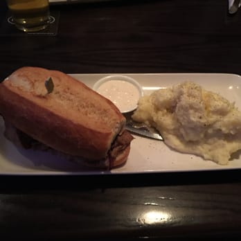 The Blake House - shaved prime rib sandwich topped with swiss cheese in a baguette, with a side of mashed potatoes - Pubs Near Me - Toronto, Ontario The Blake House - shaved prime rib sandwich topped with swiss cheese in a baguette, with a side of mashed potatoes - Pubs Near Me - Toronto, Ontario