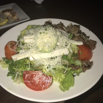 Steiner Ranch Steakhouse - Nasty, salty salad with huge chunks of vegetables and too much cheese. Notice the pieces of tough steak on the side. - Steakhouses Near Me - Austin, Texas