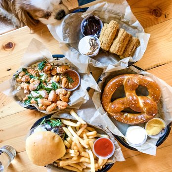 Seattle Cider Taproom - Doggos welcome! S'mores churros, pretzel, and burger all great! Gnocchi tots, fine but not as great as I wanted them to be. - Breweries Near Me - Seattle, Washington