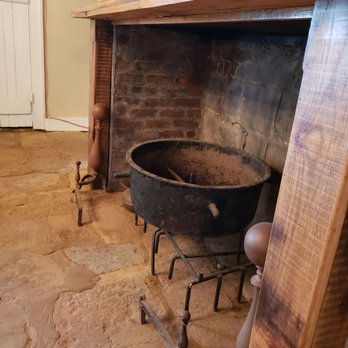 Darby's Tavern - an old cast iron pot in the fireplace - Cocktail Bars Near Me - South Boston, Virginia Darby's Tavern - an old cast iron pot in the fireplace - Cocktail Bars Near Me - South Boston, Virginia