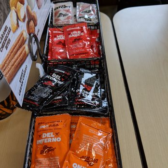 Del Taco - Sauce packets on the table - Mexican Near Me - Gresham, Oregon