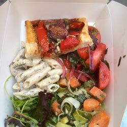 Lucky Days - Fig and tomato flatbread and choice of three salads: roasted carrot, tomato basil, and pasta salad.