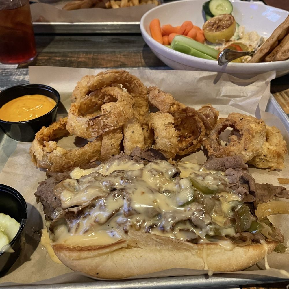 Drunken Philly with Beer Cheese and a side of onion rings Drunken Philly with Beer Cheese and a side of onion rings