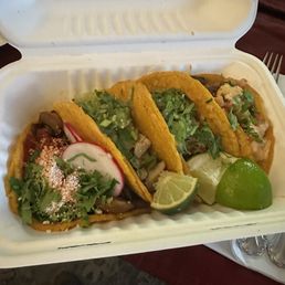 Four street tacos.