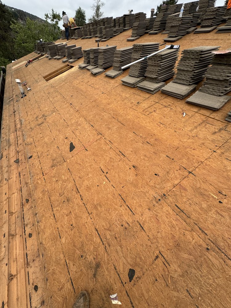 Slide of Millennium Roofing