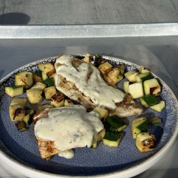 California Fish Grill - Salmon and swai plate with "two servings" of rosemary zucchini on the side - Fish & Chips Near Me - Daly City, California