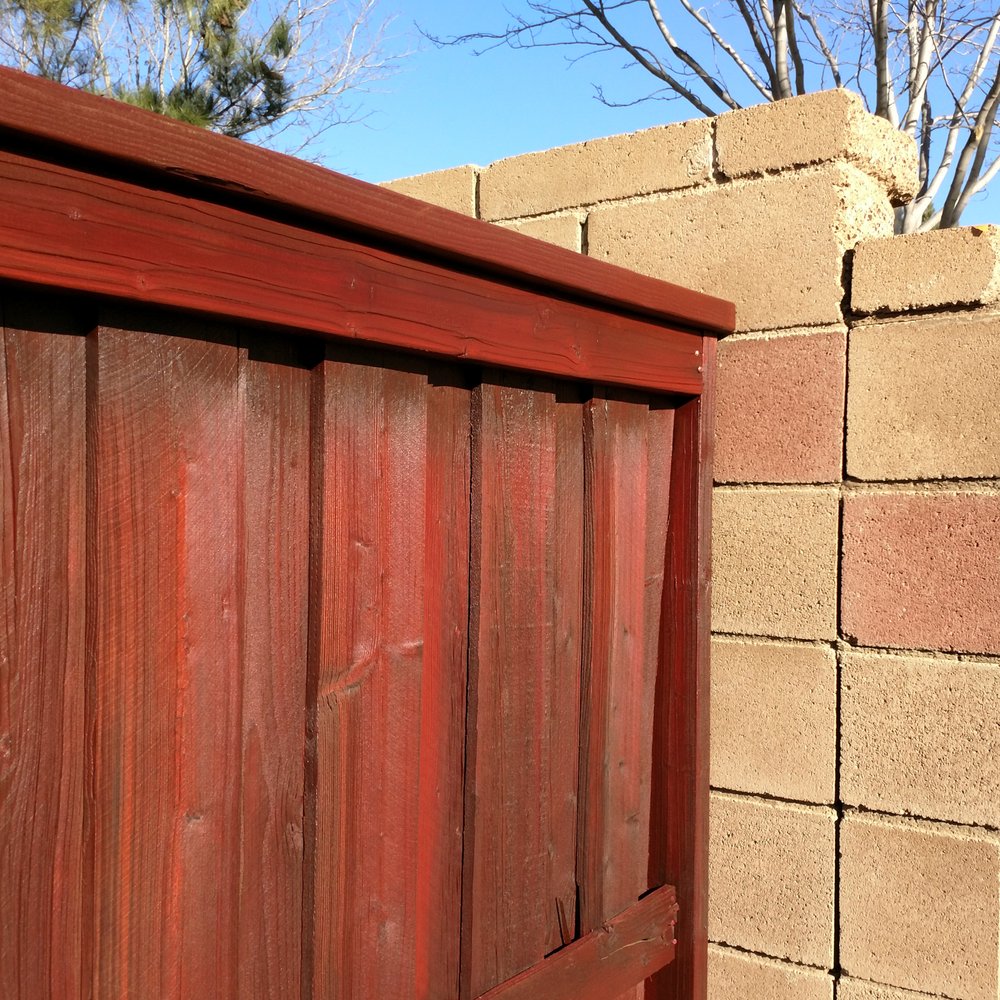 Ewing Painting - This old section of fence had been stained twice before. Again, they applied two coats of stain. See how they avoided overspray on the wall? - Painters Near Me - Beaumont, California