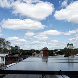 Revolution Solar - Flat roof solar installation in DC