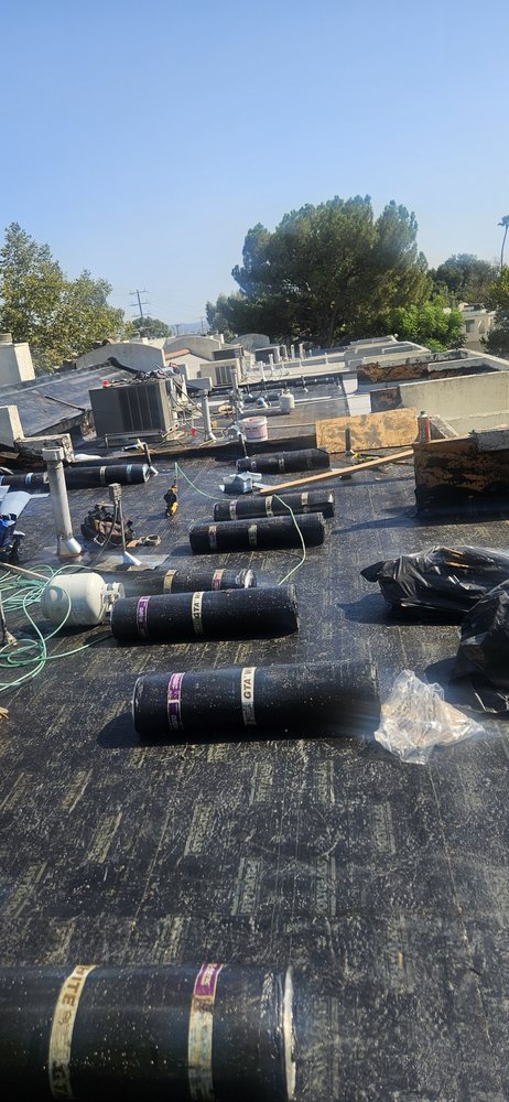 Slide of Femat Roofing