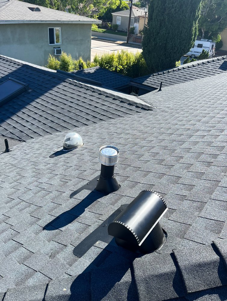 Slide of TopStamp Roofing