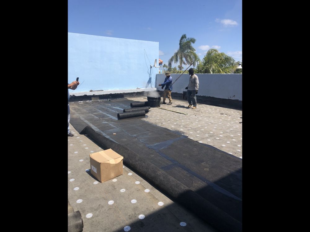 Slide of V & A Roofing