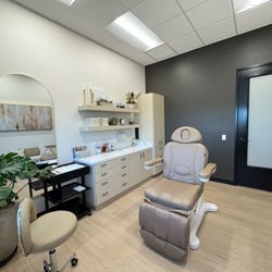 Auri Aesthetics | Premier Medspa - Toomy treatment spaces.