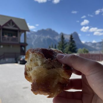 Fergie's Bakery & Convenience - a hand holding a pastry - Grocery Near Me - Canmore, Alberta Fergie's Bakery & Convenience - a hand holding a pastry - Grocery Near Me - Canmore, Alberta