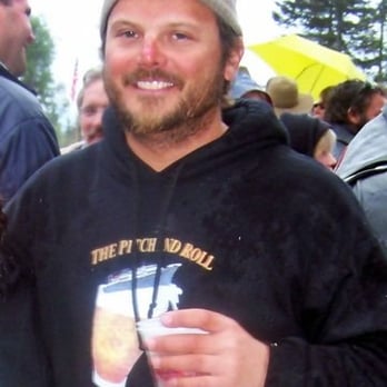 Bear Creek Winery & Lodging - Neil Brody, lucky racer, enjoys Bear Creek's wine. - Bed & Breakfast Near Me - Homer, Alaska Bear Creek Winery & Lodging - Neil Brody, lucky racer, enjoys Bear Creek's wine. - Bed & Breakfast Near Me - Homer, Alaska