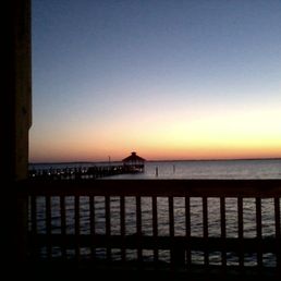 Can't beat the view of the pier leading to the gazebo to watch the sunset Can't beat the view of the pier leading to the gazebo to watch the sunset
